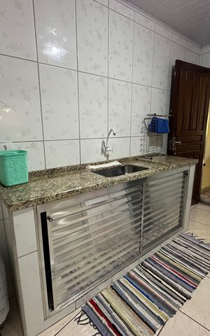 Casa à venda com 121m², 2 quartos e 2 vagas Casa à venda com 121m², 2 quartos e 2 vagasCozinha