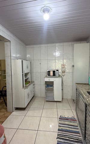 Casa à venda com 121m², 2 quartos e 2 vagas Casa à venda com 121m², 2 quartos e 2 vagasCozinha