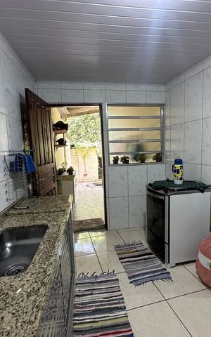 Casa à venda com 121m², 2 quartos e 2 vagas Casa à venda com 121m², 2 quartos e 2 vagasCozinha