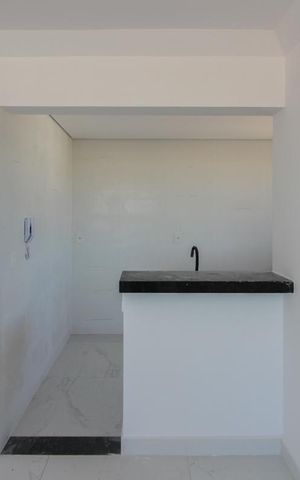 Apartamento à venda com 63m², 2 quartos e 1 vaga Apartamento à venda com 63m², 2 quartos e 1 vagaCozinha e Área de Serviço