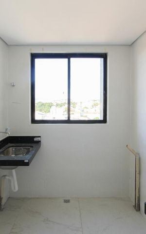 Apartamento à venda com 63m², 2 quartos e 1 vaga Apartamento à venda com 63m², 2 quartos e 1 vagaCozinha e Área de Serviço