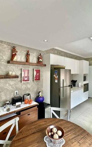 Casa à venda com 216m², 4 quartos e 4 vagas Casa à venda com 216m², 4 quartos e 4 vagasCozinha