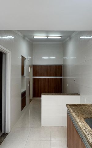 Casa à venda com 104m², 3 quartos e 2 vagas Casa à venda com 104m², 3 quartos e 2 vagasCozinha