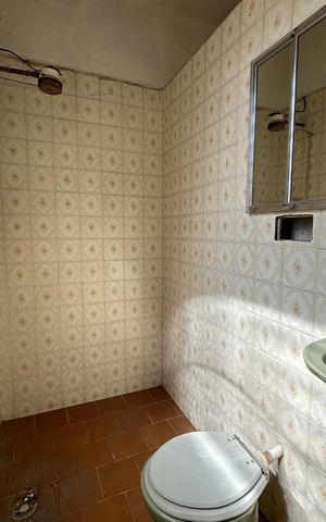 Casa à venda com 220m², 4 quartos e sem vagaBanheiro 2