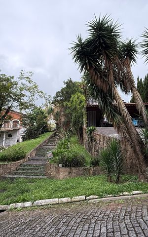 Casa de condomínio à venda com 450m², 5 quartos e 6 vagas Casa de condomínio à venda com 450m², 5 quartos e 6 vagasFachada da Casa