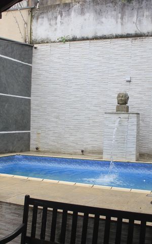 Casa à venda com 242m², 4 quartos e 4 vagasEspaço Gourmet e piscina