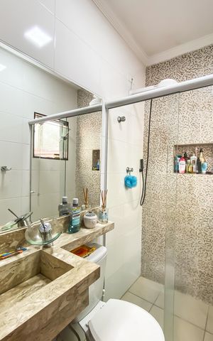 Casa à venda com 68m², 2 quartos e 2 vagas Casa à venda com 68m², 2 quartos e 2 vagasBanheiro da Suíte