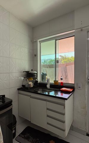 Casa de condomínio à venda com 60m², 2 quartos e sem vaga Casa de condomínio à venda com 60m², 2 quartos e sem vagaCozinha