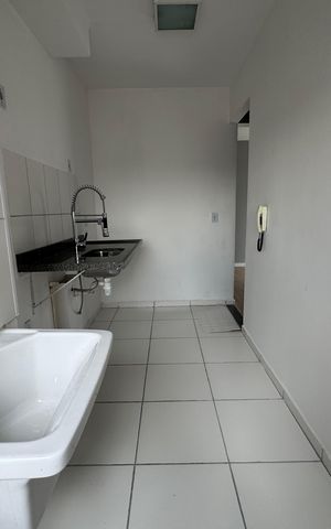 Apartamento à venda com 48m², 2 quartos e 1 vaga Apartamento à venda com 48m², 2 quartos e 1 vagaCozinha e Área de Serviço