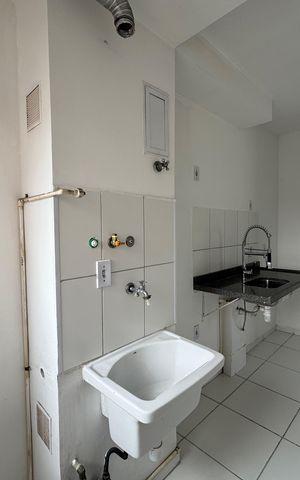Apartamento à venda com 48m², 2 quartos e 1 vaga Apartamento à venda com 48m², 2 quartos e 1 vagaCozinha e Área de Serviço