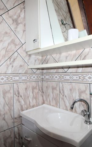 Casa à venda com 180m², 2 quartos e 2 vagasBanheiro