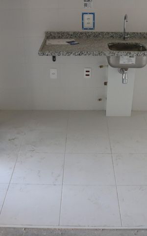 Apartamento à venda com 55m², 2 quartos e 1 vagaCozinha e Área de Serviço