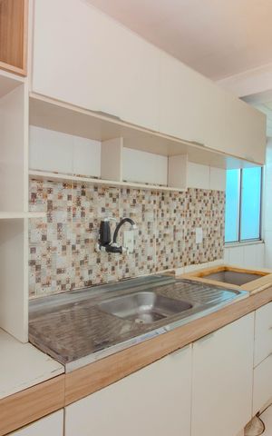 Apartamento à venda com 48m², 2 quartos e 1 vaga Apartamento à venda com 48m², 2 quartos e 1 vagaCozinha e Área de Serviço
