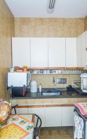 Casa à venda com 220m², 3 quartos e 3 vagas Casa à venda com 220m², 3 quartos e 3 vagasCozinha e Área de Serviço