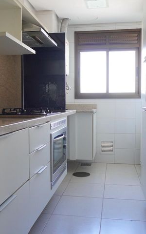 Apartamento à venda com 84m², 3 quartos e 2 vagas Apartamento à venda com 84m², 3 quartos e 2 vagasCozinha e Área de Serviço