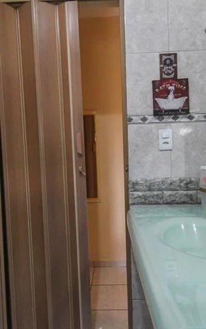 Casa à venda com 186m², 3 quartos e 3 vagas Casa à venda com 186m², 3 quartos e 3 vagasBanheiro da Suíte 1