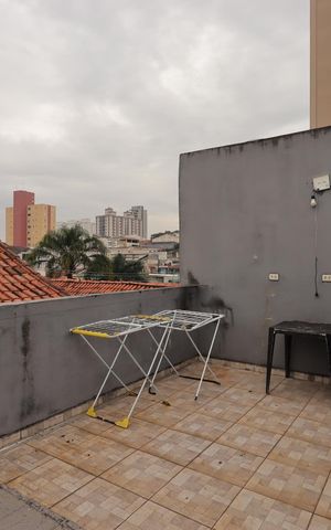 Casa à venda com 200m², 4 quartos e 2 vagasCobertura da Casa 2