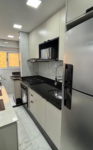 Casa à venda com 54m², 2 quartos e 1 vaga Casa à venda com 54m², 2 quartos e 1 vagaCozinha