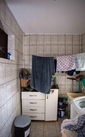 Casa à venda com 180m², 3 quartos e 1 vagaÁrea de Serviço Casa 1