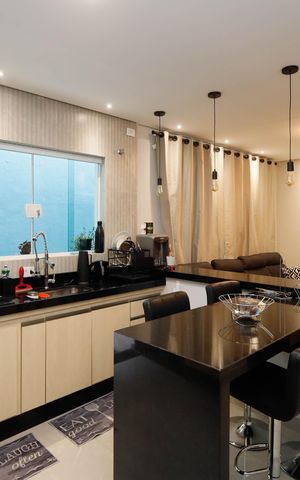 Casa à venda com 90m², 2 quartos e 2 vagas Casa à venda com 90m², 2 quartos e 2 vagasSala / Cozinha