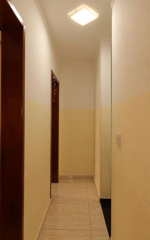 Casa à venda com 55m², 3 quartos e 2 vagasCorredor
