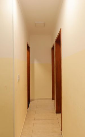 Casa à venda com 55m², 3 quartos e 2 vagasCorredor