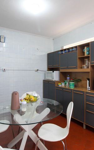 Casa à venda com 86m², 2 quartos e 2 vagas Casa à venda com 86m², 2 quartos e 2 vagasCozinha