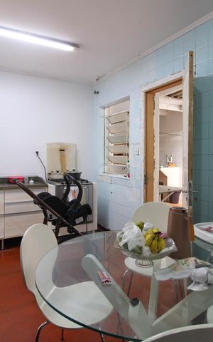 Casa à venda com 86m², 2 quartos e 2 vagas Casa à venda com 86m², 2 quartos e 2 vagasCozinha