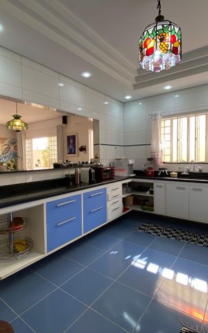 Casa à venda com 240m², 4 quartos e 4 vagas Casa à venda com 240m², 4 quartos e 4 vagasCozinha