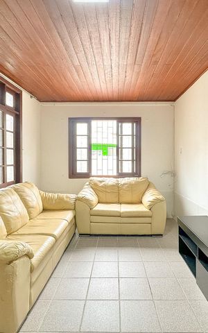 Casa para alugar com 70m², 2 quartos e 2 vagasSala de TV