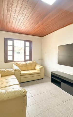 Casa para alugar com 70m², 2 quartos e 2 vagasSala de TV