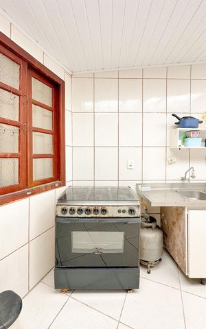 Casa para alugar com 70m², 2 quartos e 2 vagasCozinha