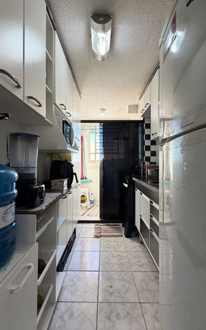 Apartamento à venda com 48m², 2 quartos e 1 vaga Apartamento à venda com 48m², 2 quartos e 1 vagaCozinha