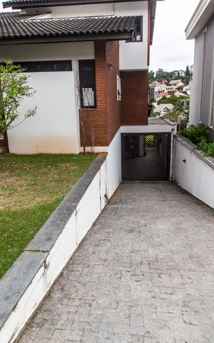 Casa de condomínio à venda com 426m², 5 quartos e 4 vagas Casa de condomínio à venda com 426m², 5 quartos e 4 vagasGaragem