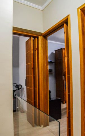 Casa à venda com 64m², 3 quartos e 1 vaga Casa à venda com 64m², 3 quartos e 1 vagaCorredor