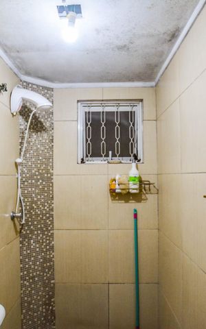 Casa à venda com 64m², 3 quartos e 1 vaga Casa à venda com 64m², 3 quartos e 1 vagaBanheiro