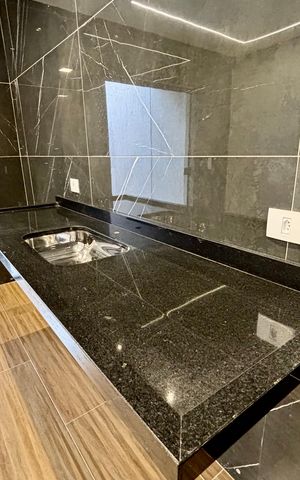 Casa à venda com 134m², 3 quartos e 2 vagas Casa à venda com 134m², 3 quartos e 2 vagasCozinha