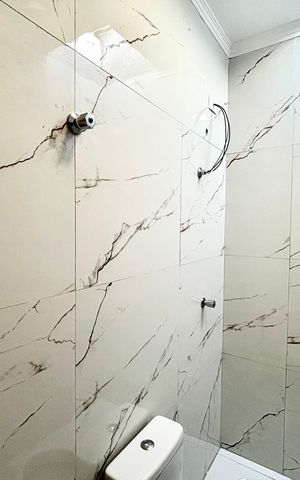 Casa à venda com 134m², 3 quartos e 2 vagas Casa à venda com 134m², 3 quartos e 2 vagasBanheiro da Suíte 1