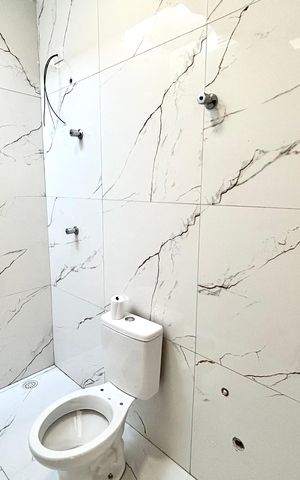 Casa à venda com 134m², 3 quartos e 2 vagas Casa à venda com 134m², 3 quartos e 2 vagasBanheiro da Suíte 2