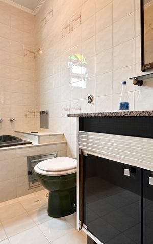 Casa à venda com 185m², 2 quartos e 2 vagas Casa à venda com 185m², 2 quartos e 2 vagasBanheiro da Suíte
