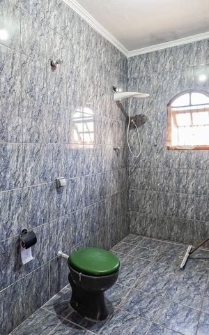 Casa à venda com 140m², 4 quartos e 2 vagas Casa à venda com 140m², 4 quartos e 2 vagasBanheiro 1