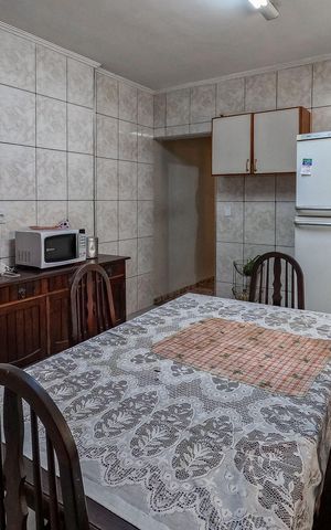 Casa à venda com 140m², 4 quartos e 2 vagas Casa à venda com 140m², 4 quartos e 2 vagasCozinha