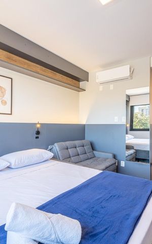 Studio para alugar com 26m², 1 quarto e 1 vaga Studio para alugar com 26m², 1 quarto e 1 vagaQuarto