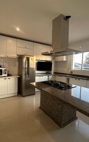 Casa de condomínio para alugar com 450m², 4 quartos e 4 vagas Casa de condomínio para alugar com 450m², 4 quartos e 4 vagasCozinha