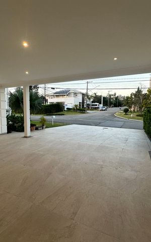 Casa de condomínio para alugar com 450m², 4 quartos e 4 vagas Casa de condomínio para alugar com 450m², 4 quartos e 4 vagasGaragem