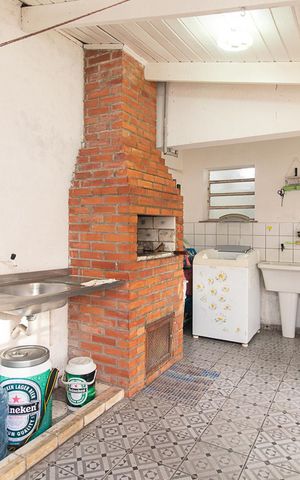 Casa à venda com 200m², 4 quartos e 2 vagasÁrea de Serviço