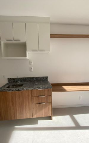 Studio à venda com 29m², 1 quarto e sem vaga Studio à venda com 29m², 1 quarto e sem vagaSala / Cozinha