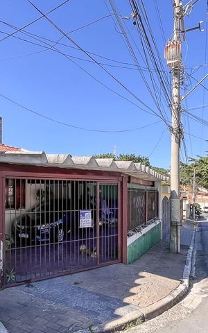 Casa à venda com 270m², 4 quartos e 2 vagasFachada + plaquinha