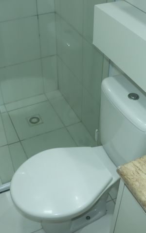 Casa de condomínio para alugar com 140m², 4 quartos e 3 vagasBanheiro da Suíte 2