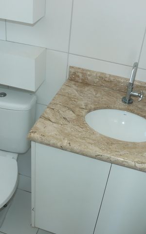 Casa de condomínio para alugar com 140m², 4 quartos e 3 vagasBanheiro da Suíte 1 